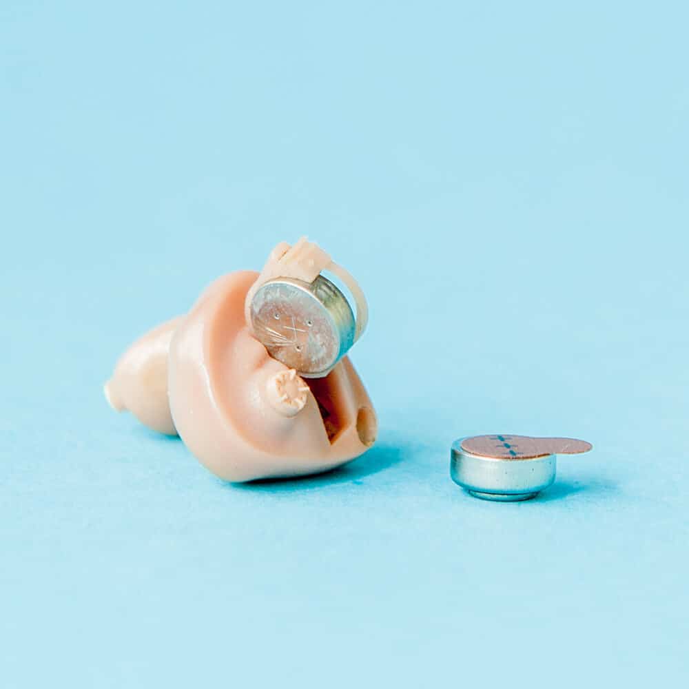 hearing aid with hearing aid battery out